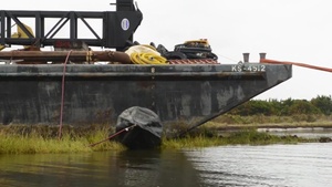 Coast Guard, partner agencies refloat barge in Avon, NC