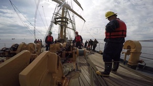 Eagle crewmembers set the anchor