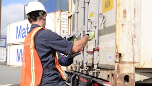 Multi-Agency Strike Force Operations inspect containers at Matson terminal in Honolulu