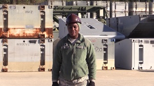 SPC Katrice Harrell sends a holiday greeting to her family in Newport News, VA.