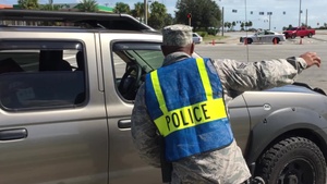 U.S. Airmen from the 116th Security Forces Squadron discuss the Security Forces career field