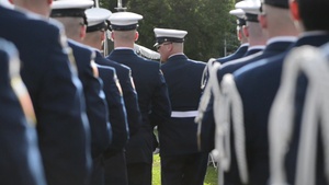 Coast Guard Ceremonial Honor Guard Silent Drill Team performs at Pearl Harbor Memorial Parade