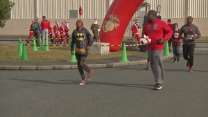 Service members and families participate in the annual MCAS Iwakuni Jingle Bell Jog
