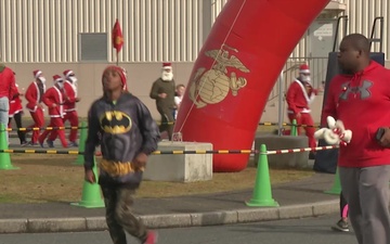 Service members and families participate in the annual MCAS Iwakuni Jingle Bell Jog
