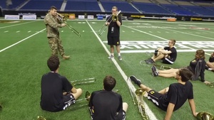 Soldier Gives Musical Pointers to All-American Marching Band