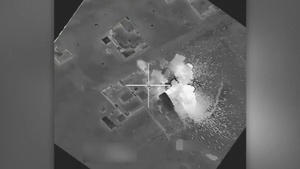 Coalition airstrike destroys an ISIL-held building near Mosul, Iraq.