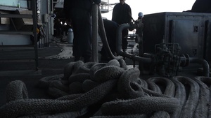 Sailors Haul Line on USS Dwight D. Eisenhower