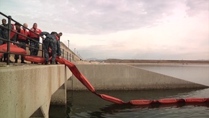Sailors work with the Japanese to prevent disasters on the air station