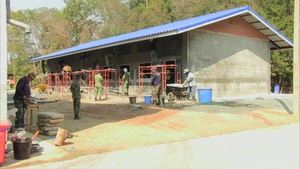 Members of the U.S. Navy and Partner Nations work together to build a classroom during Cobra Gold 2017