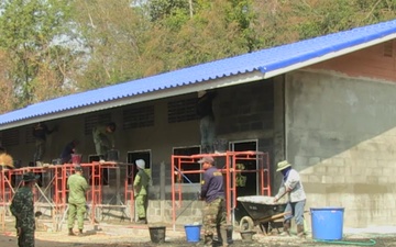 Members of the U.S. Navy and Partner Nations work together to build a classroom during Cobra Gold 2017