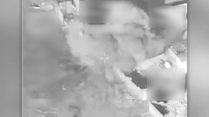 Coalition airstrike destroys an ISIS tank near Mosul, Iraq.
