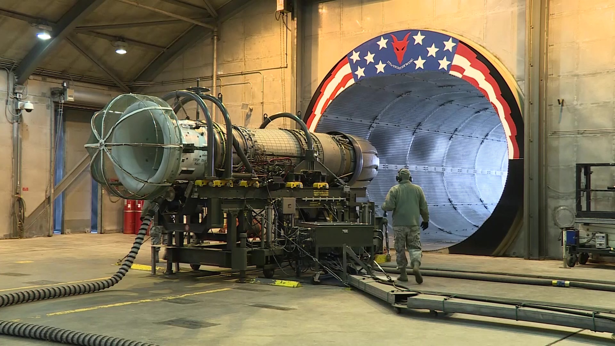 A gas turbine engine from a U.S. Air Force F-16C+ Fighting Falcon, assigned to the New Jersey Air National Guard&#39;s 177th Fighter Wing, is tested at full afterburner at the Atlantic City Air National Guard Base in Egg Harbor Township, N.J. on Jan. 31, 2017.<br />The Engine Test Cell Facility, commonly referred to as the  &quot;Hush House,&quot; is a multi-function building used to perform diagnostic, troubleshooting and follow-on maintenance testing on uninstalled engines and high powered installed engine testing<br />while the engine is in the F-16 aircraft. The General Electric F110-GE-100 turbofan produces close to 29,000 pounds of static thrust in afterburner, which can propel the Fighting Falcon to approximately twice the speed of sound.