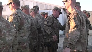 Guardsmen receive combat patch in Helmand Broll