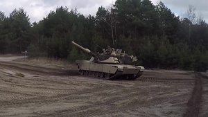 Polish and U S troops conduct Tank Maneuverability Training
