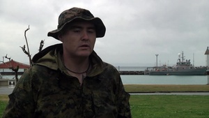 3rd LAR Corpsman cares for his Marines