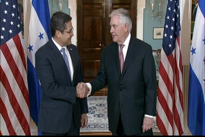 Secretary of State Rex Tillerson camera spray