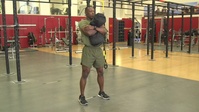 Sandbag Bear Hug Squat