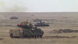 US and Romanian forces train in the wind and rain