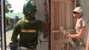 U.S. and Philippine service members build school together
