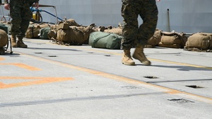 31st Marine Expeditionary Unit Marine on load aboard LHD 6