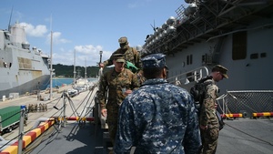 31st Marine Expeditionary Unit Marine on load aboard LHD 6