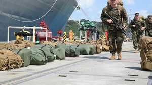 31st Marine Expeditionary Unit Marine on load aboard LHD 6
