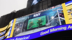 Navy Divers from Explosive Ordnance Disposal Group (EODGRU) 2 in the dive tank in Times Square as part of Fleet Week New York 2017