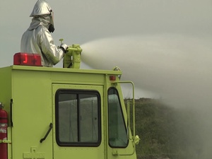 Aircraft Rescue and Firefighting Marines train with live fire (B-Roll)