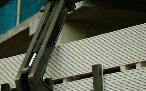 Construction B-Roll: Drywall off-loading 1