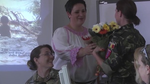 US, Romanian forces welcomed by students