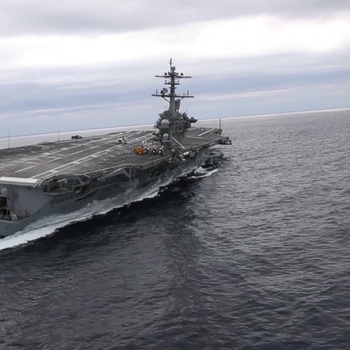 Nimitz-class aircraft carrier USS Abraham Lincoln (CVN 72) performs high-speed turns in the Atlantic Ocean
