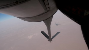 KC-135 Stratotanker Refuels F-22 Raptors and F-15 Strike Eagle