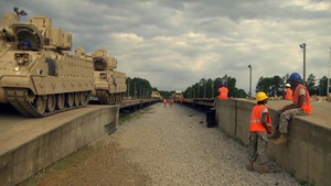 Mississippi National Guard Soldiers Unload Equipment During AT