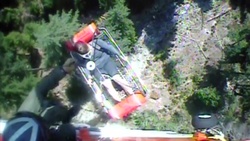 Coast Guard helicopter crew hoists female hiker to safety near Agness, Oregon