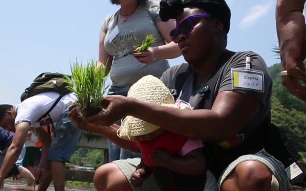 Station residents plant rice with Japanese locals