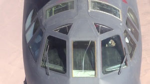 KC-135s Refuel B-52 and F-22s