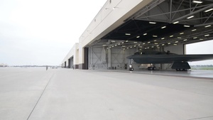 B-2 Spirit Stealth bomber taxiing out of hanger
