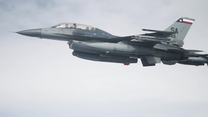 Twin fighter pilots reunite during combat exercise