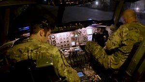 KC-10 Extender refuels F-22 Raptors