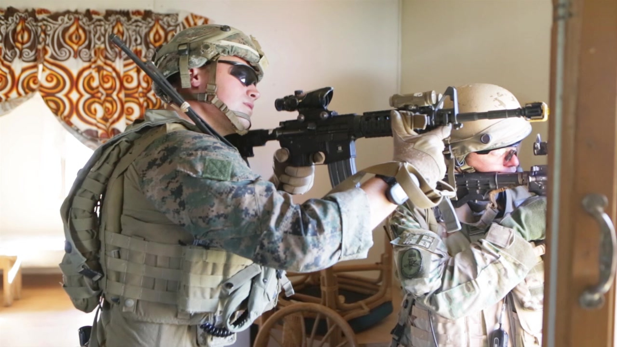 U.S. Marines with 6th Air Naval Gunfire Liaison Company, Force Headquarters Group, Marine Forces Reserve, and soldiers with the 31st Georgian Light Infantry Battalion, conducted a Mission Rehearsal Exercise as part of the Georgia Deployment Program- Resolute Support Mission aboard the Joint Multinational Readiness Center, Hohenfels, Germany, Aug. 16-22, 2017.