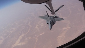 KC-135 refuels F-22 Raptors over Iraq