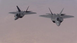 KC-135 refuels F-22 Raptors over Iraq