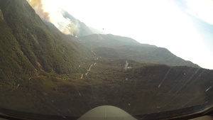 U.S. Air National Guardsmen from 146th Airlift Wing battle Pier Fire with C-130 fire fighting aircraft.
