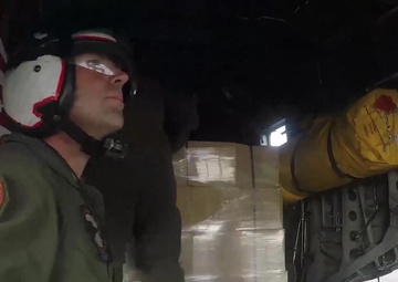 Navy Squadron Delivers Food, Water