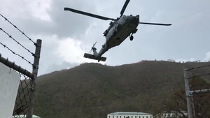 U.S. Navy helicopter crew evacuating medical patients to St. Croix