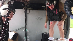 USS Wasp (LHD 1) provide aid to evacuees