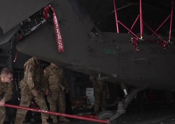 B-roll 2 of 3 of 101st Airborne Division (AASLT) Soldiers preparing HH-60 medevac Blackhawk helicopters for loading onto a C-5 Galaxy