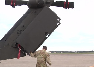 B-roll 1 of 3 of 101st Airborne Division (AASLT) Soldiers preparing HH-60 medevac Blackhawk helicopters for loading onto a C-5 Galaxy