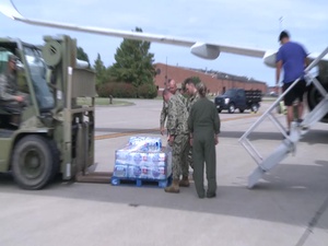 Evacuees from Naval Air Station Key West Leave Scott AFB
