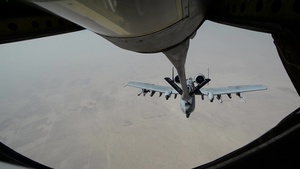 KC-135 Stratotanker refuels A-10 Thunderbolt IIs
